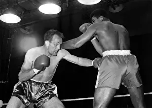 00378 Prints: Henry Cooper and Cassius Clay ( Muhammad Ali ) fight for the World Heavyweight Boxing