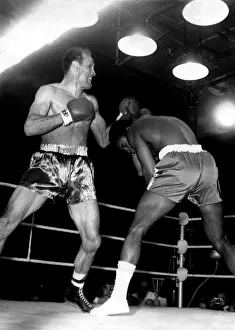 00378 Prints: Henry Cooper and Cassius Clay ( Muhammad Ali ) fight for the World Heavyweight Boxing