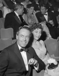 Italian Prints: Henry Fonda and 4th wife Afdera Franchetti at the theatre in London - May 1957