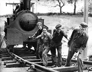The Hetton a 132 year old locomotive being pulled into a shed at Beamish Museum by staff