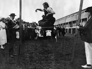 High jumping for girls at London sports event in connection with a garden-party