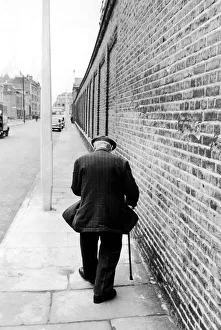 Loneliness Prints: The high walls surrounding the Old Peoples home in Southern Grove, Stepney