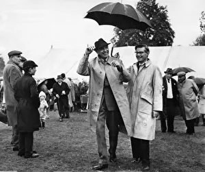 Even the high winds and poring rain couldn t keep the smile from Sir Alec Douglas