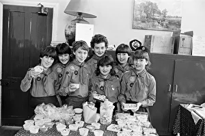 Highburton Guides are pictured with home made sweets at a coffee morning which raised