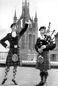 Bagpipes Prints: Highland dancer Dick Harrison and piper Bill Hughes having a last practice before they