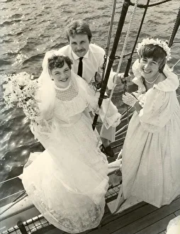 Bridesmaids Prints: Hilary Brough, 21, married Neil Sowdon an electrican, also aged 21, at Stanton Church
