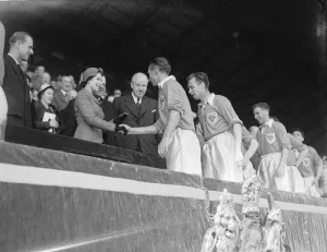 Shaking Hands Prints: HM Queen Elizabeth ll 1953 presenting medals at the FA Cup Final