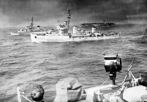 HMS Bramble (J 11) an Algerine Class minesweeper and HMS Foam (J405