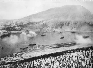 HMS Cossack (close to the wreck of a German transport in foreground