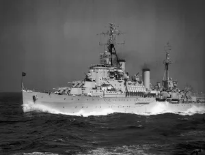 HMS Gambia A Royal Navy Mauritius class cruiser at full speed at sea off of Malta in