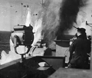 01445 Prints: HMS Illustrious attacked by dive bombers in the Mediterranean off the Italian island of