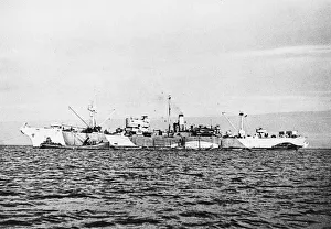 HMS Latimer seen here shortly after laying one of the fuel pipes connecting the United