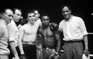 00199 Prints: Hogan Kid Bassey after beating Gene Sneyers (left) in Liverpool 1954