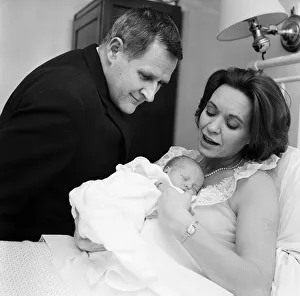 Newborn Prints: Holding her 12-hour old baby is stage and TV actress Lillias Walker