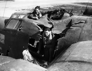 A hole in a USAF Consolidated Liberator B25 bomber after bombing mission over