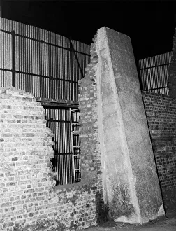 Espionage Prints: Hole in the wall at Worwood Scrubs prison where master spy George Blake escaped