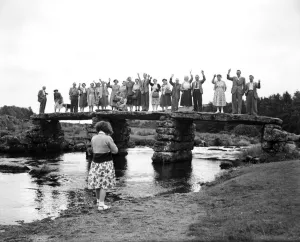 00530 Prints: Holidaymakers on a Clapper Bridge (a bridge built of solid granite by ancient Britons