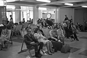 Holidaymakers waiting for their delayed flight to be called at Southend Airport 13th July