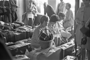 01219 Prints: Holidaymakers waiting for their delayed flight to be called at Southend Airport 13th July