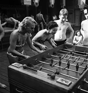 Lido Prints: Holidays: The football season has started in England but on the left bank of the Seine