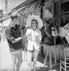 00065 Prints: Holidays: Holidaymakers: Tourists explore the fishing villages of Corsica