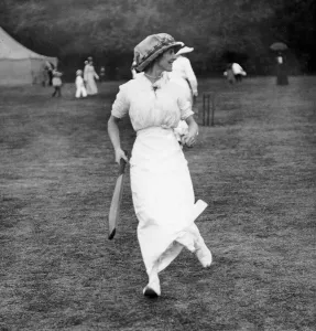 00279 Prints: Holland House Fete. Woman cricketer Mrs Solomon batting. July 1913