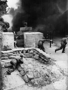 01448 Prints: Home Guard attacking a tank with a Molotov Cocktail during an exercise