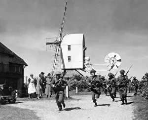 2nd World War Prints: Home Guard volunteers run through a training exercise in the Suffolk village of