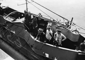 Home at last. Some of submarine crew in Hatch photographed after safe arrival at Base