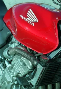 The Honda Hornet 600CC Motorbike April 1998 Fuel Tank badge and engine