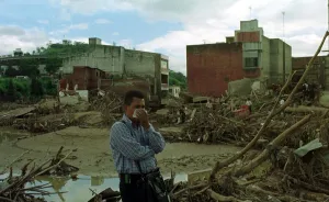 Central America Prints: Honduras Weather Hurricane Mitch Nov 1998 Debris mounted up behind him