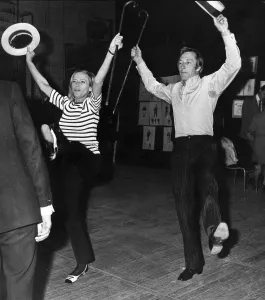 Honor Blackman dancing with John Neville during rehearsals for stage play Mr