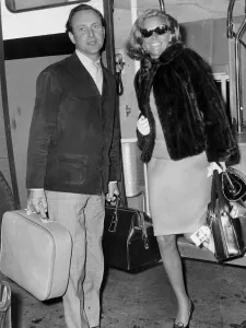 Honor Blackman and David Jacobs at London airport - May 1966 -----