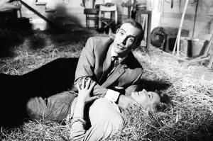 Honor Blackman as Pussy Galore and Sean Connery as James Bond seen here filming a fight