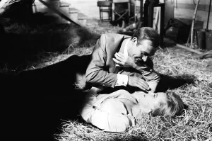 Honor Blackman as Pussy Galore and Sean Connery as James Bond seen here filming a fight