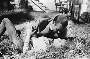Honor Blackman as Pussy Galore and Sean Connery as James Bond seen here filming a fight