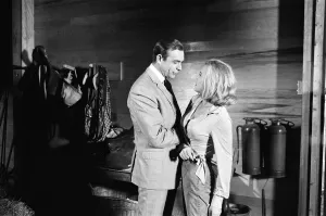 Honor Blackman as Pussy Galore and Sean Connery as James Bond seen here filming a fight