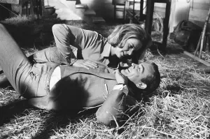 Honor Blackman as Pussy Galore and Sean Connery as James Bond seen here filming a fight