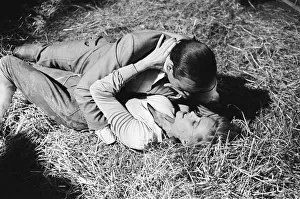 Honor Blackman as Pussy Galore and Sean Connery as James Bond seen here filming a fight