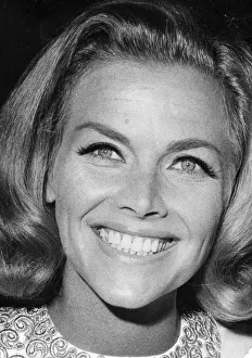 Honor Blackman smiling at premiere - September 1964 ----- HONOR