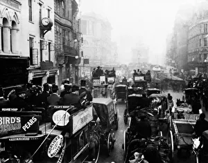 Carriages Prints: Horse drawn carriages and buses shown in congestion at The Strand, London, November 1908