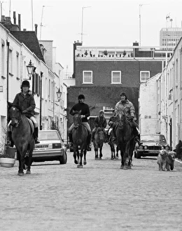 Horse riders in Hyde Park Gardens Mews on there way to the stables in Bathurst Mews