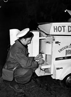 00048 Prints: Hot-dog stands on tricycles tour Manchester at night and attend many outdoor events