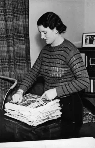 Newspapers Prints: Housewife Baling waste paper into neat bundle in Derby 15th October 1939 Paper