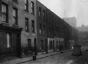 Poverty Prints: Housing Slums, residential street England Manchester circa 1950
