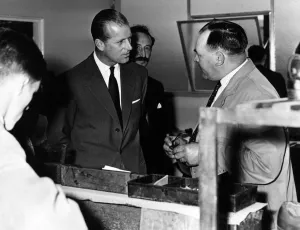 01037 Prints: HRH Prince Philip, Duke of Edinburgh chats with employee Jack Price of Dowlais