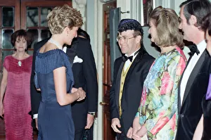01095 Prints: HRH Princess Diana, Princess of Wales is greeted by singer Elton John for a charity