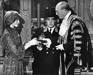 HRH Princess Diana, The Princess of Wales receives a bible after admission as a Freeman