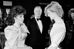 HRH Princess Diana, The Princess of Wales (right) meets actor Joan Collins at the Film