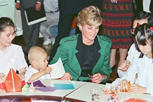 Tartan Prints: HRH Princess Diana, The Princess of Wales with workers at the Honda factory in Tokyo
